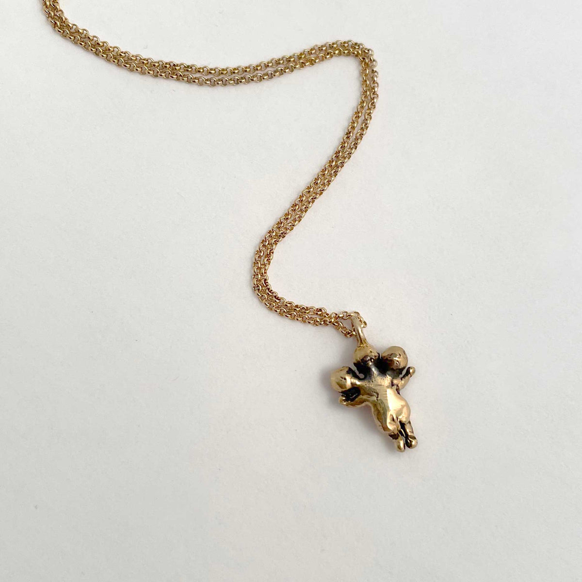 Tiny Three Headed Baby Necklace